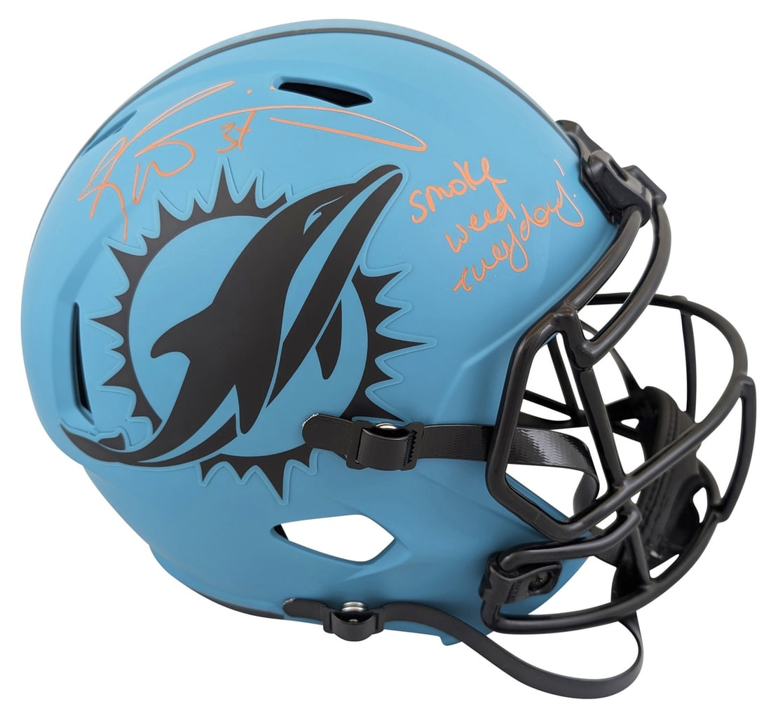 Ricky Williams Signed Miami Dolphins Rave Replica Helmet With SWE Inscription BAS Witness: Ricky Williams Signed Miami Dolphins Rave Replica Helmet With SWE Inscription BAS Witness This Miami Dolphins Rave Full Size Speed Replica Helmet features a personal inscription "Smoke Weed Everyday" 