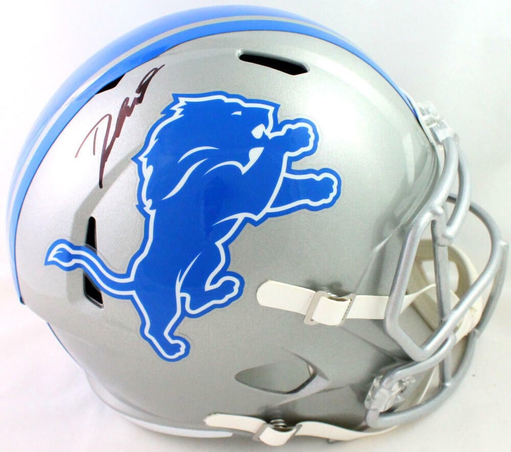 Detroit Lions Full Size Speed Helmet Signed by D'Andre Swift Fanatics Authenticated: Detroit Lions Full Size Speed Helmet Signed by D'Andre Swift Fanatics Authenticated This is a full-size Detroit Lions Speed helmet that has been hand-signed by D'Andre Swift. The autograph has been au