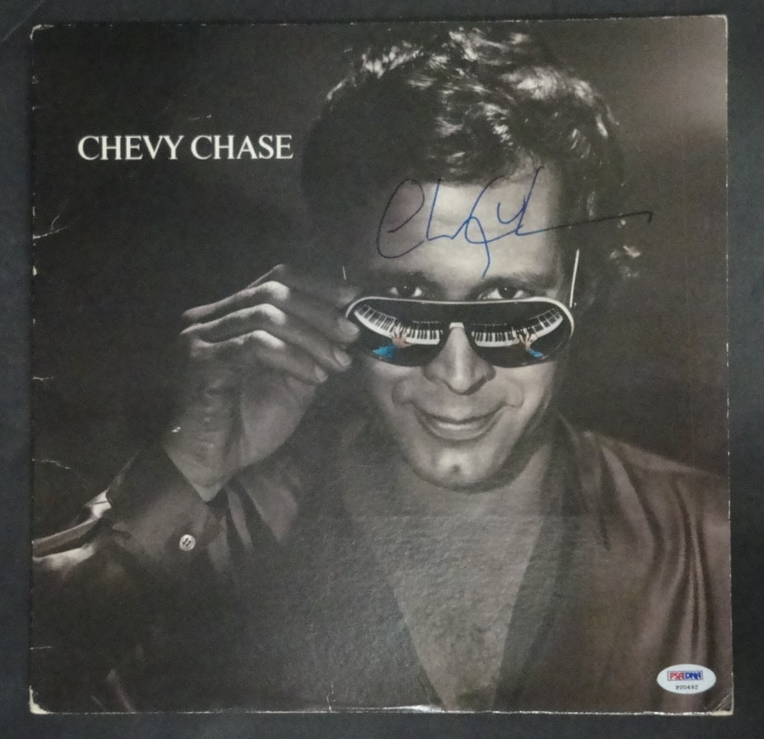 Chevy Chase Hand Signed Vintage Record Album Authenticated PSA: Chevy Chase Hand Signed Vintage Record Album Authenticated PSA This vintage record album features an authentic autograph from Chevy Chase, expertly authenticated by Professional Sports Authenticator (