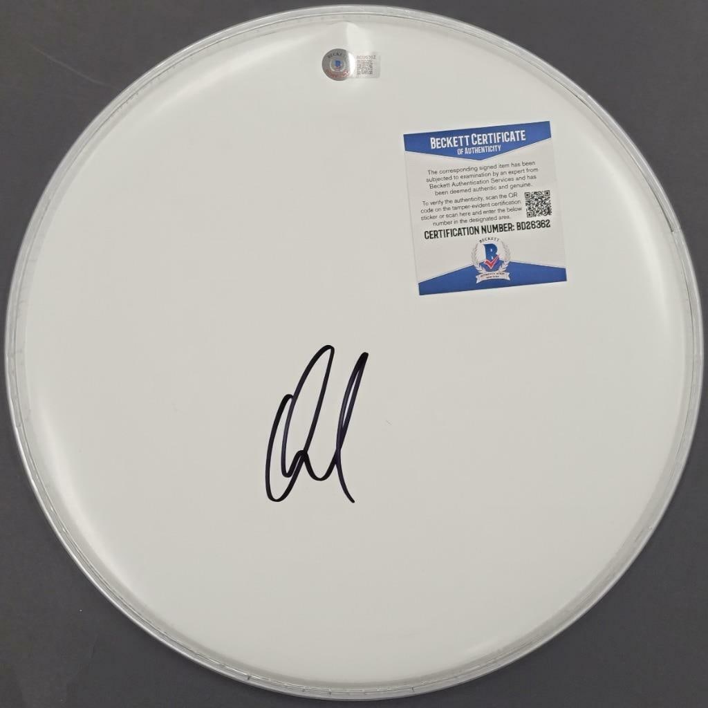Signed Drumhead by David Draiman of Disturbed with Beckett Authentication: Signed Drumhead by David Draiman of Disturbed with Beckett Authentication This is an original 12-inch drumhead signed by David Draiman, the vocalist of Disturbed. The autograph has been authenticated 