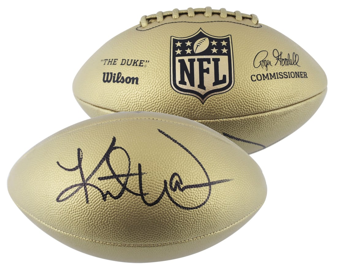 Kurt Warner Signed Wilson Metallic Gold NFL Football BAS Witnessed Authentic: Kurt Warner Signed Wilson Metallic Gold NFL Football BAS Witnessed Authentic Celebrate the legacy of Kurt Warner with this officially licensed Wilson Replica Duke Metallic Gold NFL Football, personall