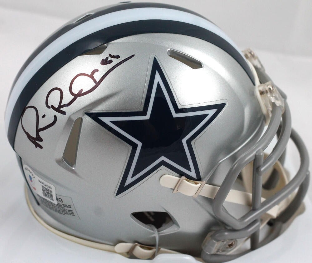 Dallas Cowboys Mini Helmet Signed by Michael Irvin Beckett Authenticated: Dallas Cowboys Mini Helmet Signed by Michael Irvin Beckett Authenticated This Dallas Cowboys Speed mini helmet features the authentic autograph of Michael Irvin. The signature has been authenticated b