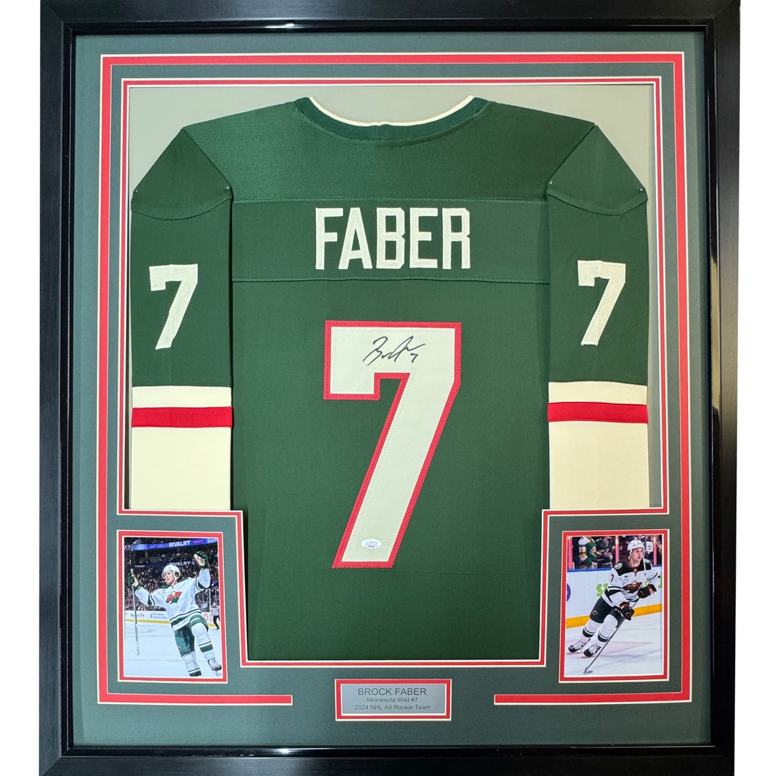 Framed Signed Brock Faber Minnesota Wild Jersey with JSA COA 35x39: Framed Signed Brock Faber Minnesota Wild Jersey with JSA COA 35x39 Celebrate your passion for hockey with this professionally framed and autographed Brock Faber Minnesota Wild jersey. Measuring an imp