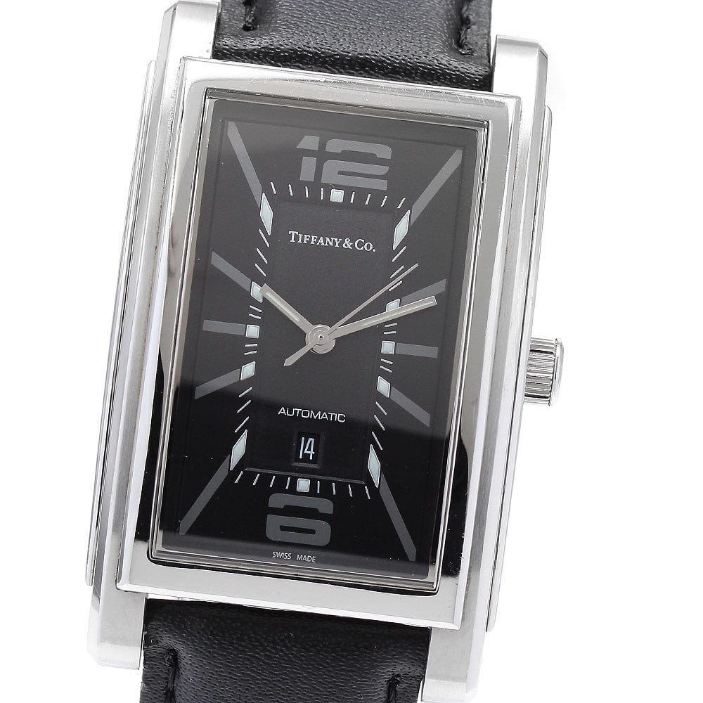 Tiffany Co Grand Date Automatic Men's Wristwatch: Tiffany Co Grand Date Automatic Men's Wristwatch This Tiffany & Co. Grand Date men's wristwatch features a stainless steel case paired with a black dial and a leather strap. The watch operates with an