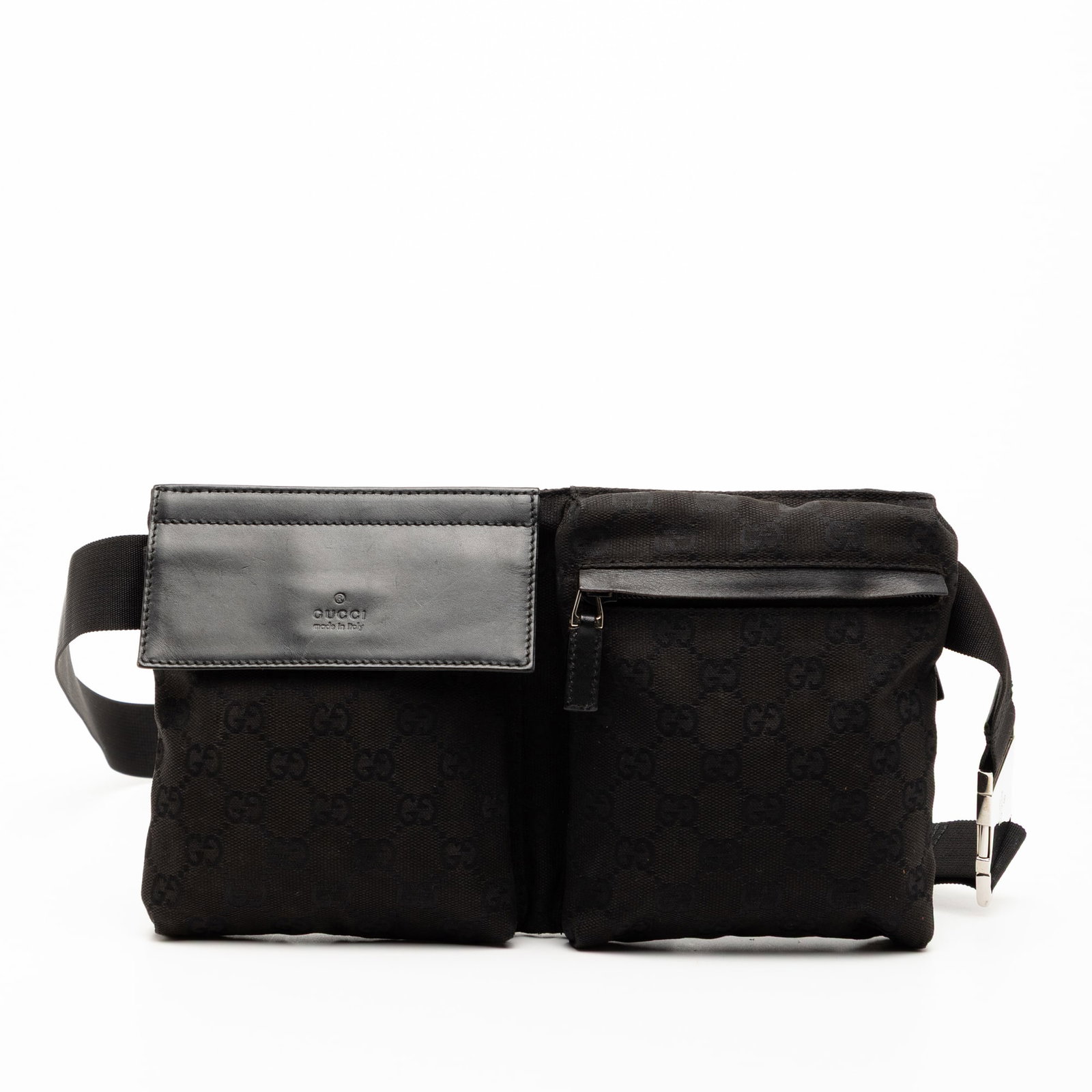 Gucci GG Canvas Black Double Pocket Waist Belt Bag with Leather Trim: Gucci GG Canvas Black Double Pocket Waist Belt Bag with Leather Trim This Gucci GG Canvas Double Pocket Belt Bag features a canvas body with leather trim, an adjustable waist strap, exterior front fla