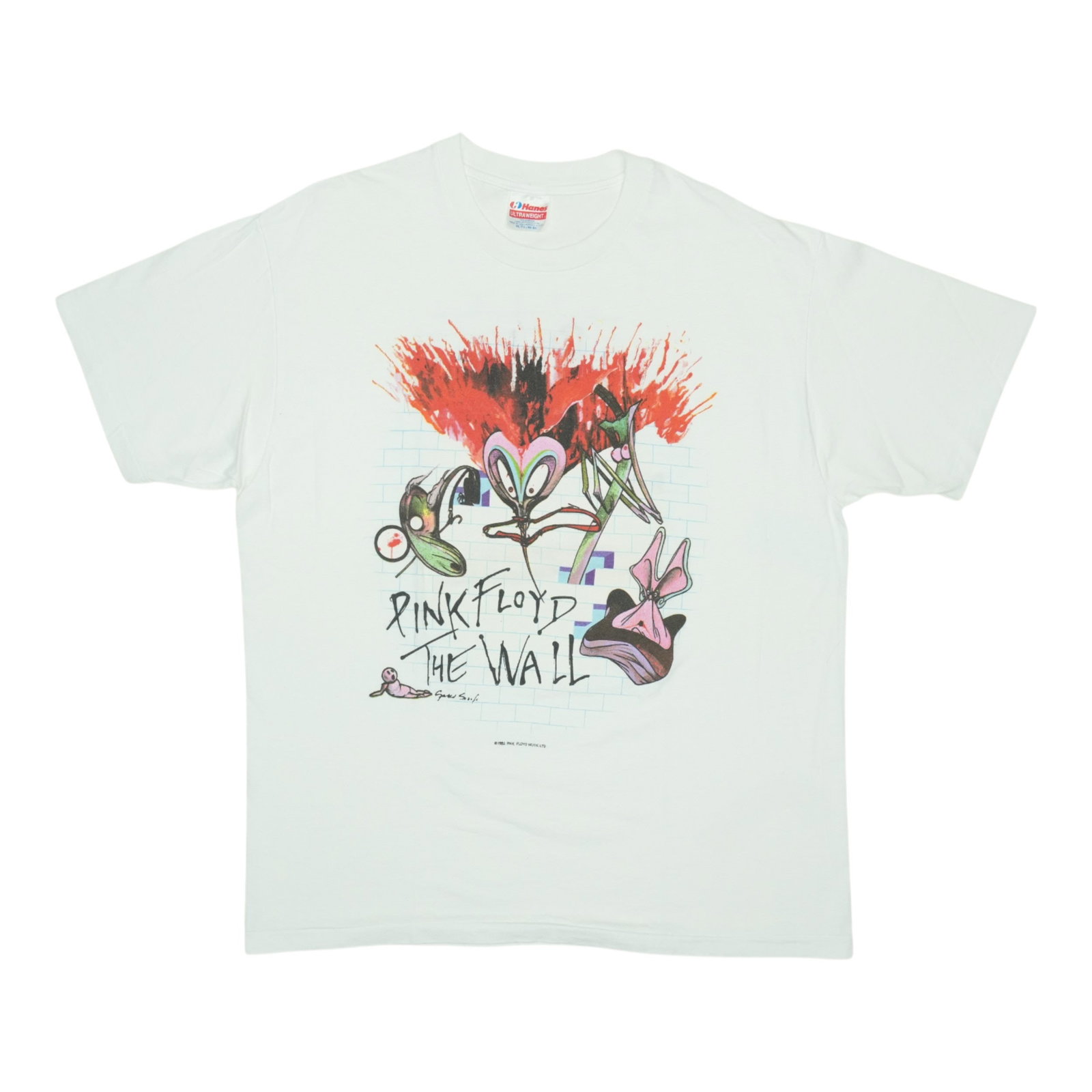 Vintage 1990s Pink Floyd The Wall Cotton Shirt White XL: Vintage 1990s Pink Floyd The Wall Cotton Shirt White XL This is an original vintage Pink Floyd The Wall shirt from the 1990s featuring front and back graphics. Made from 100% cotton, the shirt is whit