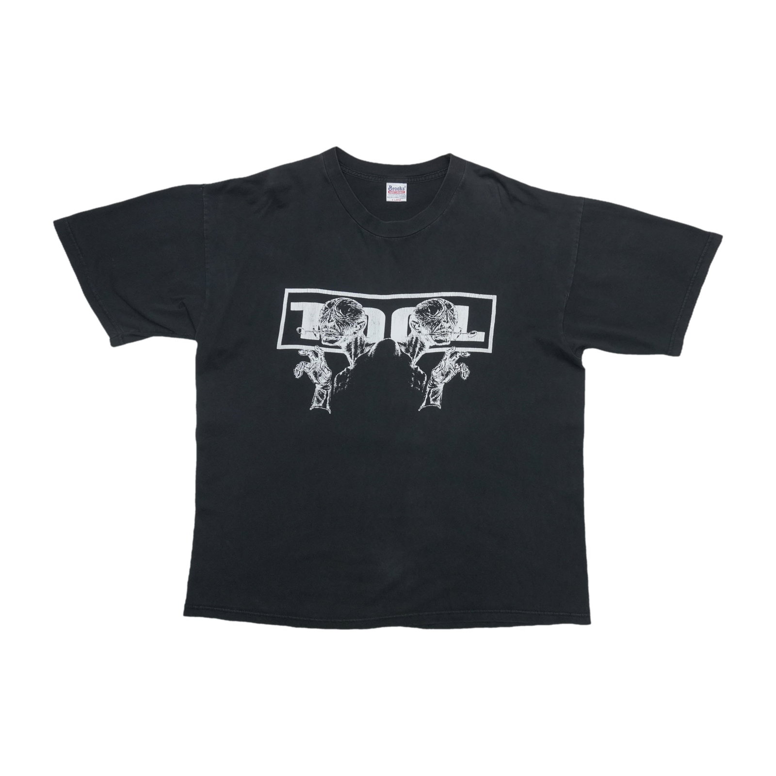 Vintage 1998 Tool concert tee black XL cotton: Vintage 1998 Tool concert tee black XL cotton This is an original vintage 1998 Tool Tour Shirt featuring front and back graphics. The shirt is made from 100% cotton in black and is tagged as extra lar