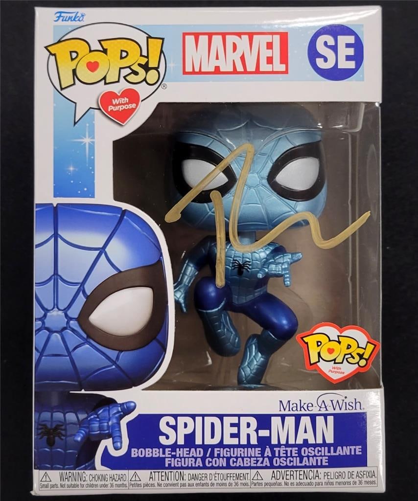 Spider-Man Funko Pop autographed by Tobey Maguire with Beckett authentication: Spider-Man Funko Pop autographed by Tobey Maguire with Beckett authentication This is an original Spider-Man Make-a-Wish Funko Pop featuring the authentic autograph of Tobey Maguire. The autograph has