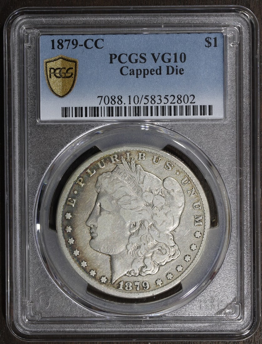 PCGS VG10 Carson City Morgan Dollar 1879 CC Key Date: PCGS VG10 Carson City Morgan Dollar 1879 CC Key Date This is an 1879-CC Morgan Silver Dollar graded VG10 by PCGS. Minted in Carson City, this key date coin is composed of 0.9 fine silver and has been 