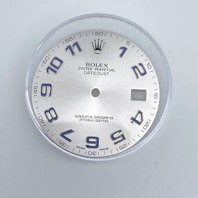 Rolex Datejust 41mm silver Arabic numeral replacement dial 116334 116300: Rolex Datejust 41mm silver Arabic numeral replacement dial 116334 116300 This is a discontinued Rolex silver Arabic numeral dial designed for the Datejust 41mm models 116334 and 116300. The dial featu