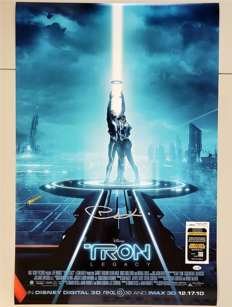 Tron Legacy 27x40 Poster Signed by Joseph Kosinski JSA Authenticated: Tron Legacy 27x40 Poster Signed by Joseph Kosinski JSA Authenticated This is an original 27x40 inch movie poster from Tron Legacy, signed by Joseph Kosinski. The autograph has been authenticated by Ja