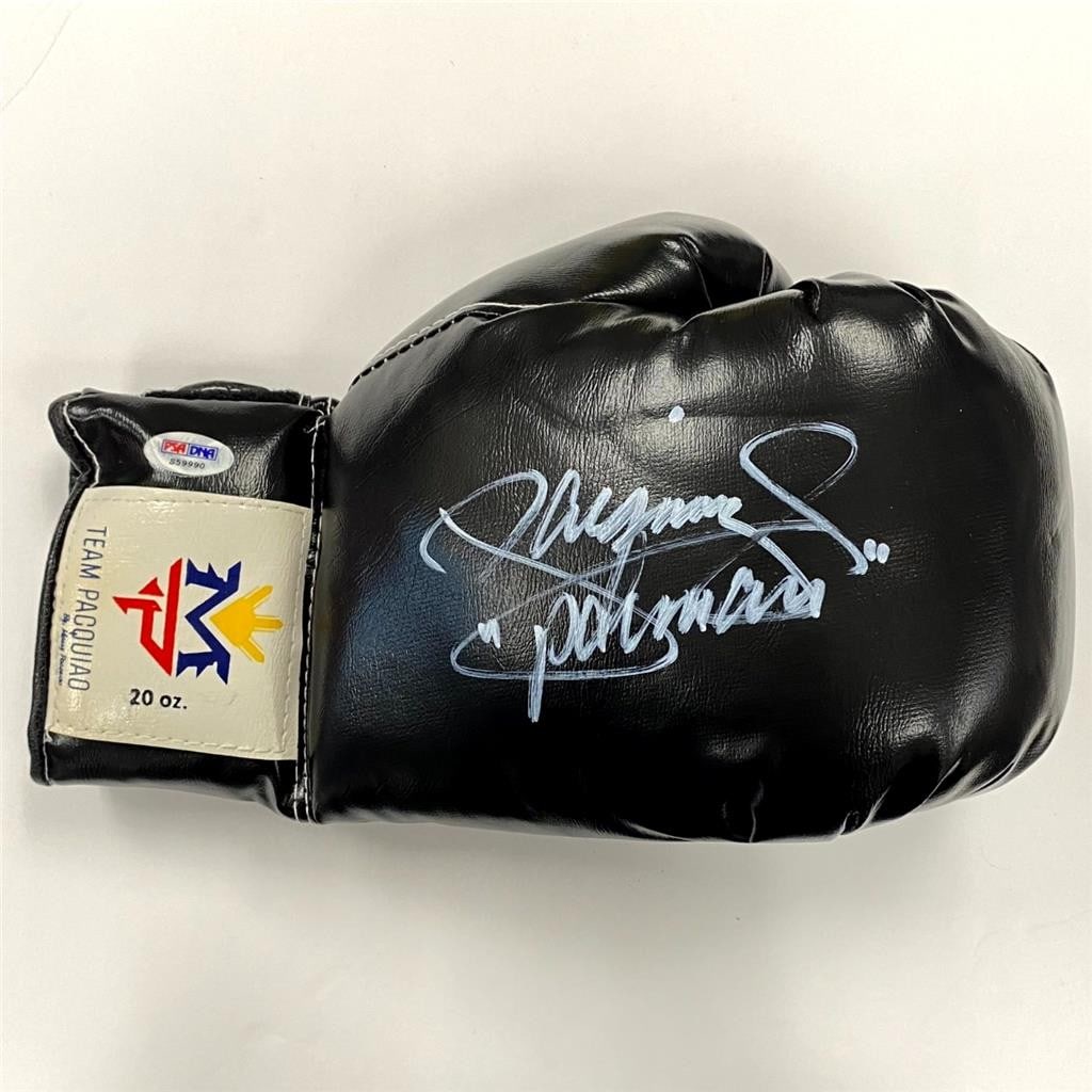 PSA authenticated Manny Pacquiao autographed Team Pacquiao boxing glove: PSA authenticated Manny Pacquiao autographed Team Pacquiao boxing glove This boxing glove is personally signed by Manny Pacquiao and features the inscription "Pacman" along with Team Pacquiao branding