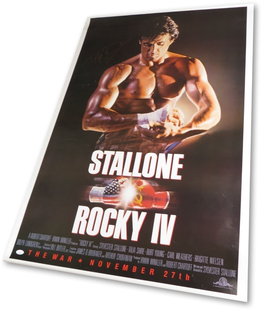 Dolph Lundgren Autographed 27x40 Rocky IV Poster JSA Certified: Dolph Lundgren Autographed 27x40 Rocky IV Poster JSA Certified This is a stunning autographed poster featuring Dolph Lundgren as Ivan Drago from the iconic film Rocky IV. Measuring 27X40 inches, this 