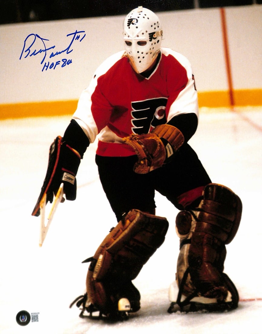 Bernie Parent Signed 11x14 Photo HOF 84 Beckett Certified: Bernie Parent Signed 11x14 Photo HOF 84 Beckett Certified This autographed 11x14 photograph features Philadelphia Flyers legend Bernie Parent, a Hockey Hall of Fame inductee. The photograph is signed 