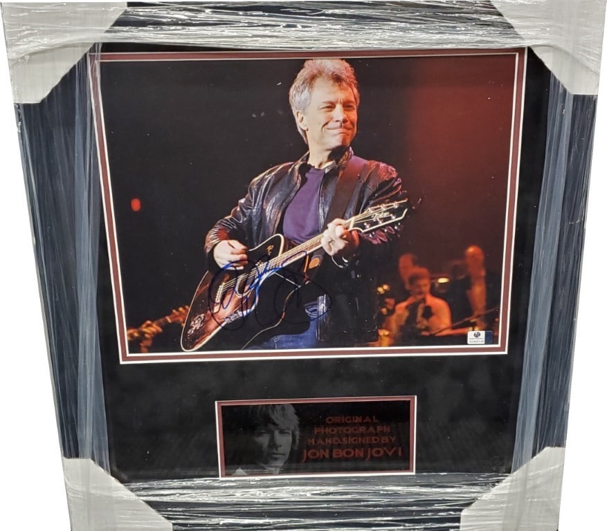 Jon Bon Jovi Signed 11x14 Photo Framed Authentic Global Authentics: Jon Bon Jovi Signed 11x14 Photo Framed Authentic Global Authentics This stunning 11x14 photograph captures rock star Jon Bon Jovi in action, showcasing his dynamic performance style. The photo is auth