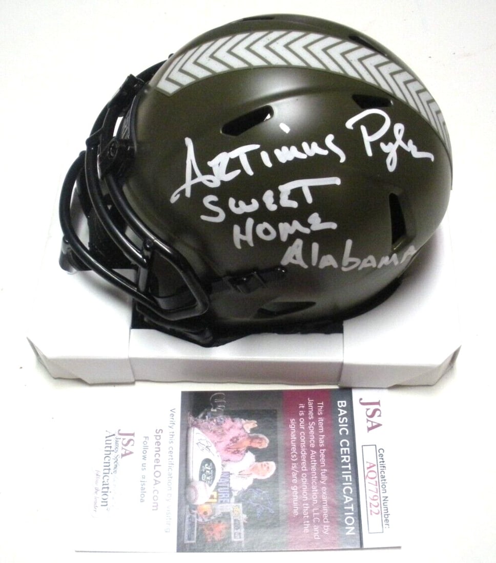 Signed Salute to Service Mini Helmet by Artimus Pyle with JSA COA: Signed Salute to Service Mini Helmet by Artimus Pyle with JSA COA This is a pre-owned mini football helmet signed by Artimus Pyle, associated with Lynyrd Skynyrd, from the Salute to Service series. Th