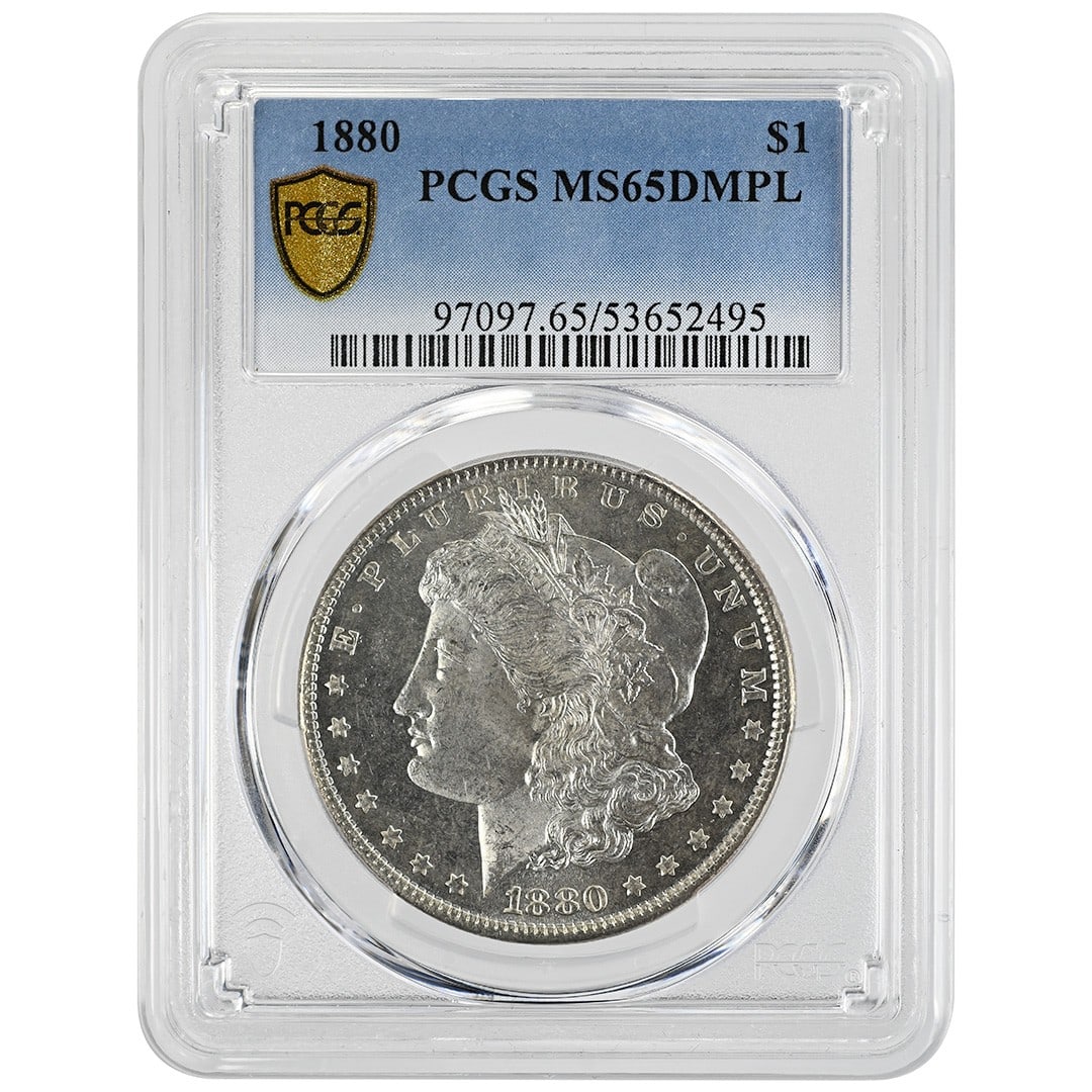 PCGS MS65DMPL 1880 Morgan Silver Dollar: PCGS MS65DMPL 1880 Morgan Silver Dollar This 1880 Morgan Dollar is a rare collectible coin from the United States, struck at the Philadelphia Mint. It features a Deep Mirror Proof-Like (DMPL) strike a