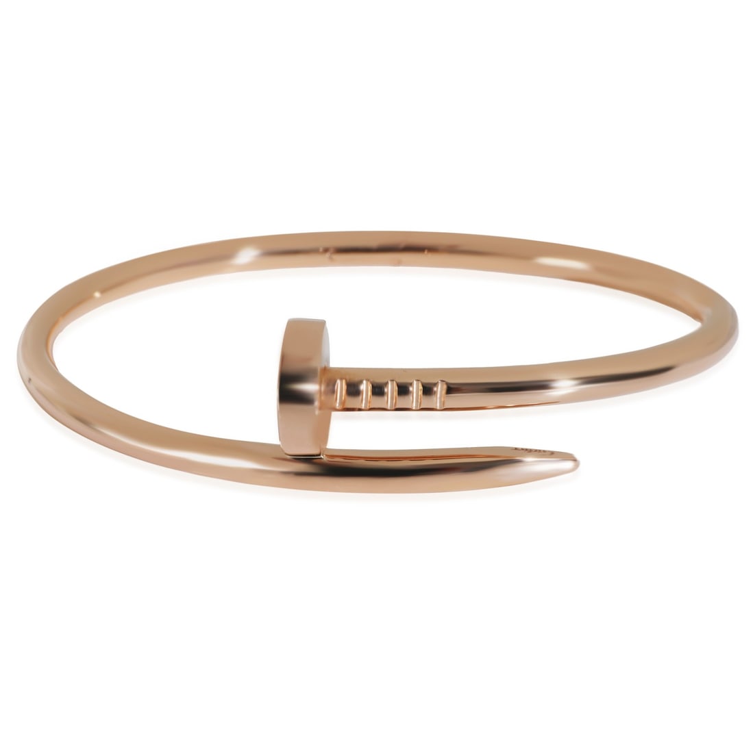 Juste Un Clou 18k Rose Gold Bracelet 17cm With Pouch and Service Papers: Juste Un Clou 18k Rose Gold Bracelet 17cm With Pouch and Service Papers This Cartier Juste Un Clou bracelet is crafted from 18k rose gold and designed for a unisex audience. The bracelet features a pu