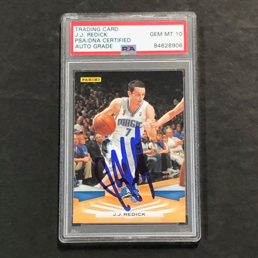 2009-10 Panini J.J. Redick Signed Card PSA/DNA Authentic Magic: 2009-10 Panini J.J. Redick Signed Card PSA/DNA Authentic Magic This is an original 2009-10 Panini #136 basketball card featuring the signature of J.J. Redick, a notable player for the Orlando Magic. T