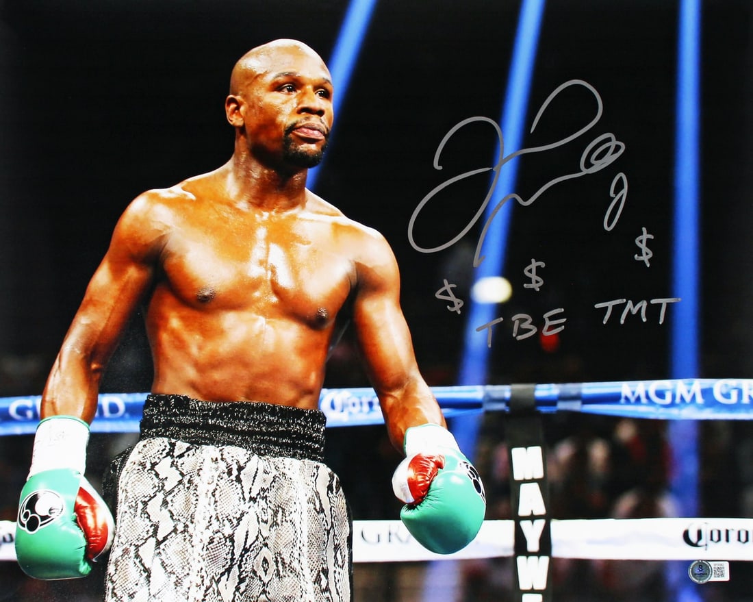 Floyd Mayweather Autographed 16x20 Boxing Photo Beckett Authenticated with Inscriptions: Floyd Mayweather Autographed 16x20 Boxing Photo Beckett Authenticated with Inscriptions This is an original 16x20 horizontal photo featuring boxing legend Floyd Mayweather. The photo is personally sig