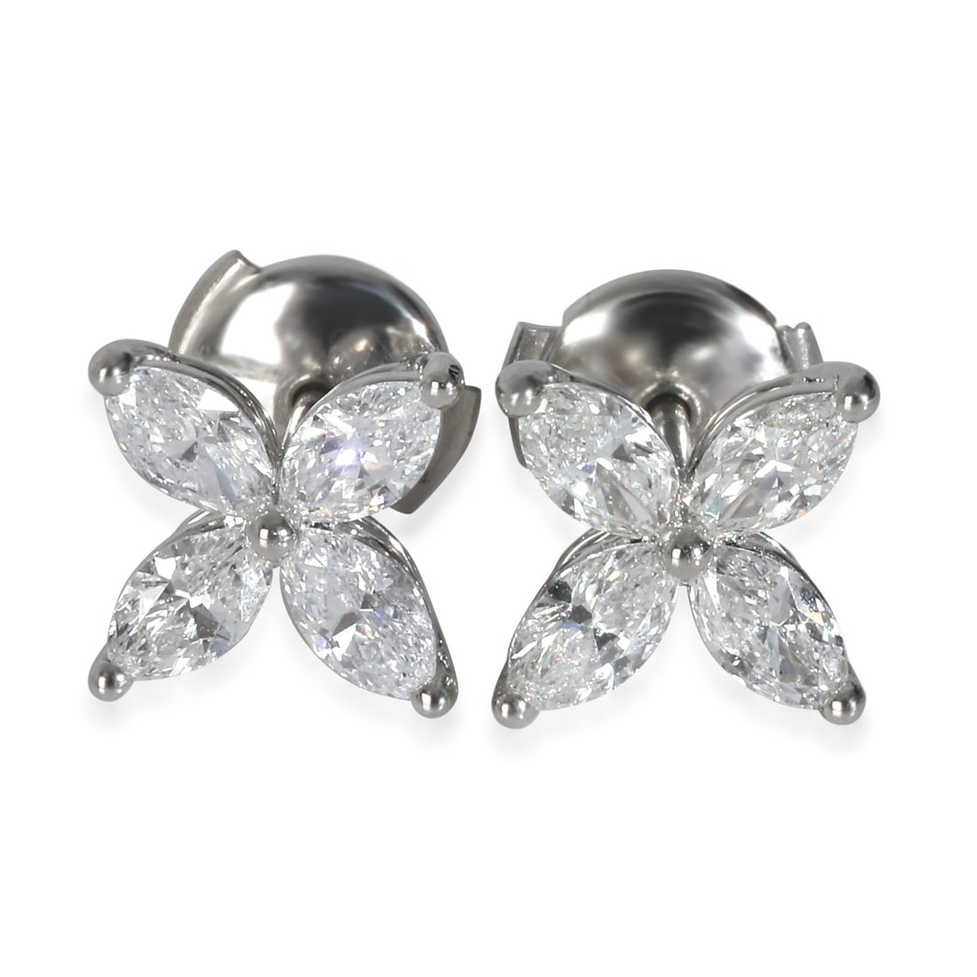 Large Victoria Collection Platinum Diamond Earrings by Tiffany & Co.: Large Victoria Collection Platinum Diamond Earrings by Tiffany & Co. These Tiffany & Co. Victoria earrings feature a large model design crafted in platinum and set with marquise-shaped diamonds. The e