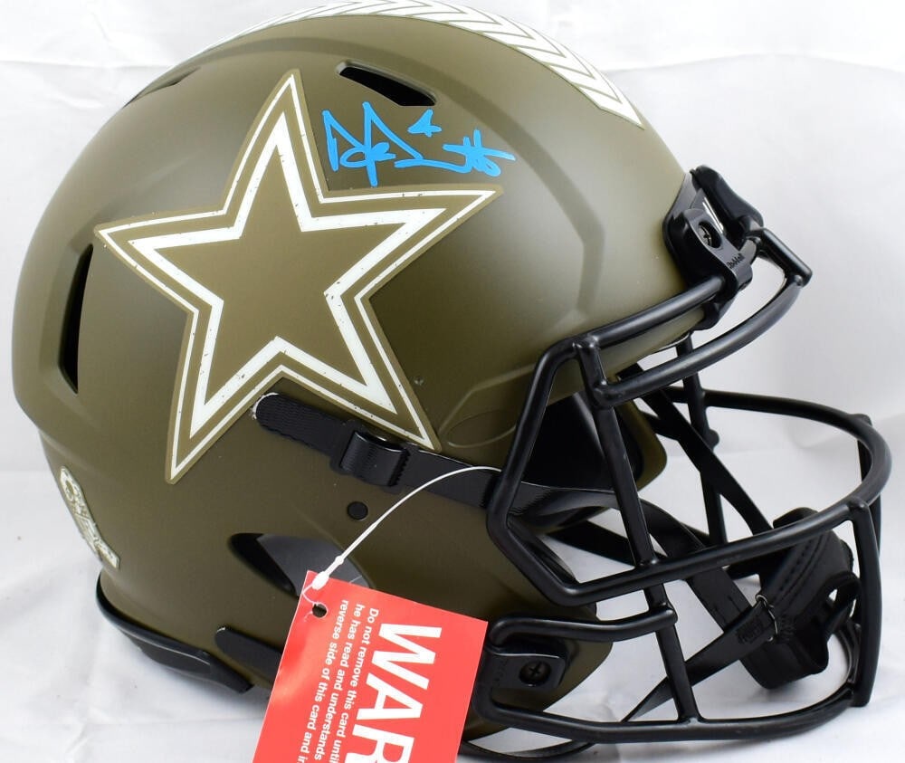Dak Prescott Autographed Cowboys Salute to Service Helmet Beckett Auth: Dak Prescott Autographed Cowboys Salute to Service Helmet Beckett Auth Showcase your support for the Dallas Cowboys with this original helmet signed by quarterback Dak Prescott. This full-size 'Salute