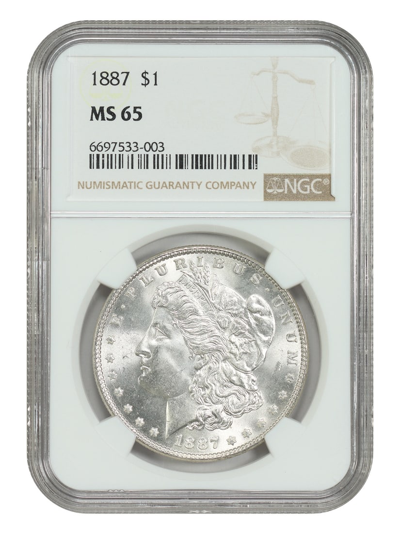 1887 Morgan Silver Dollar NGC MS65 Graded Uncirculated Coin: 1887 Morgan Silver Dollar NGC MS65 Graded Uncirculated Coin This 1887 Morgan Dollar is graded MS65 by NGC and is an uncirculated coin minted in Philadelphia. While it is considered a common date due t