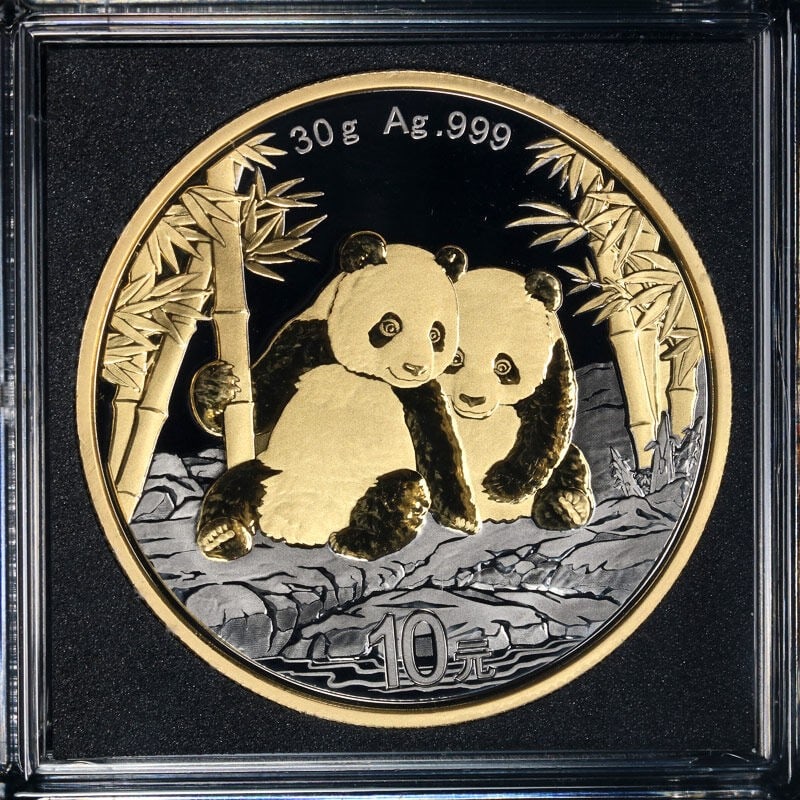 2026 China 30 Gram Silver Panda 10 Yuan Golden Ring: 2026 China 30 Gram Silver Panda 10 Yuan Golden Ring This 2026 China 30 Grams Silver 10 Yuan Panda features a golden ring design with gold and ruthenium accents. Struck in 0.999 fine silver, the coin i