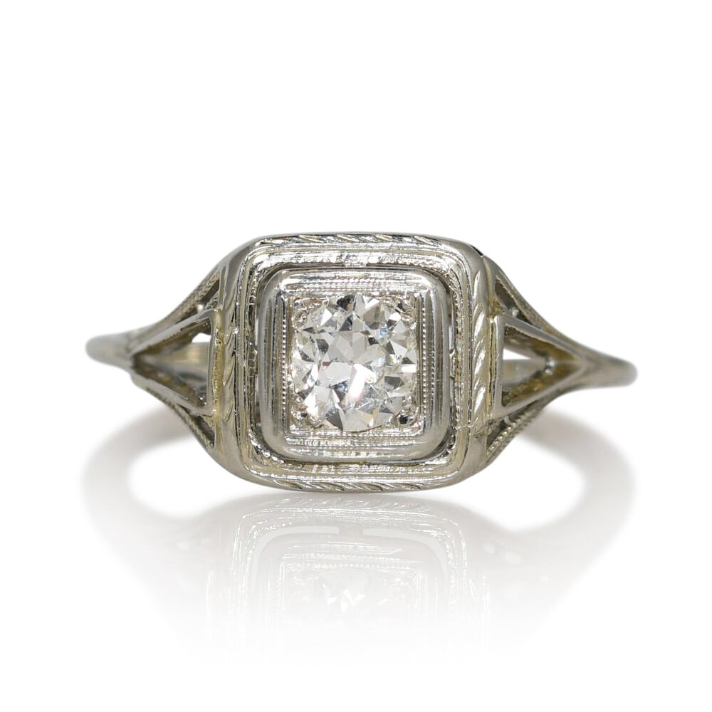 Vintage 18K White Gold Diamond Ring Old Euro Cut 0.30 ct Size 5.5: Vintage 18K White Gold Diamond Ring Old Euro Cut 0.30 ct Size 5.5 This vintage ladies' ring features an old European cut diamond set in an 18K white gold setting. The diamond weighs 0.30 carats, with 