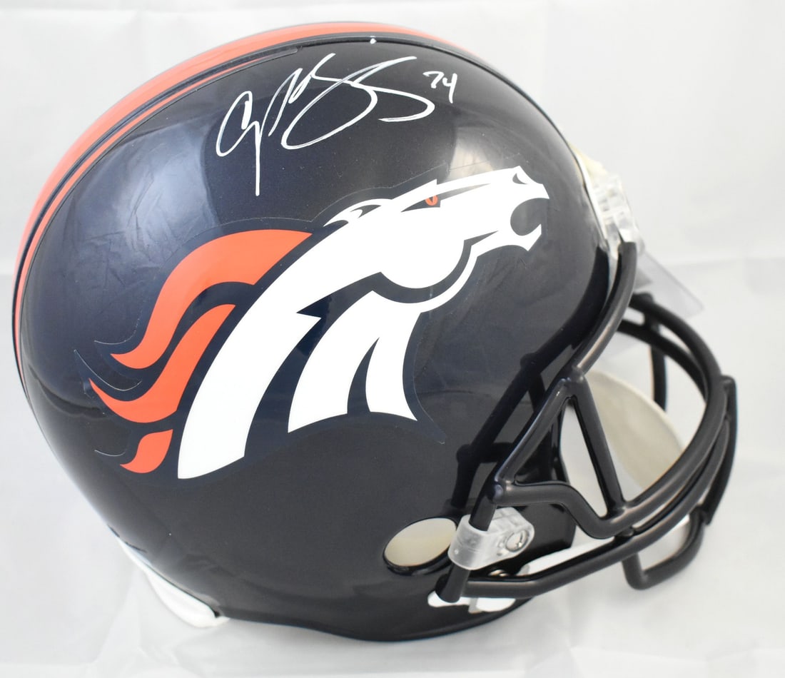 Denver Broncos Full Size Helmet Signed by Champ Bailey with Beckett Authentication: Denver Broncos Full Size Helmet Signed by Champ Bailey with Beckett Authentication This full-size Denver Broncos football helmet features the authentic signature of Champ Bailey. The helmet is an orig