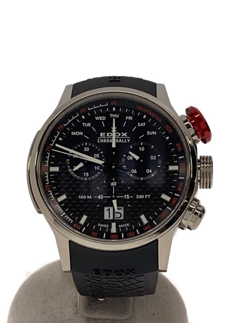 EDOX Chronorally Quartz Black Rubber Men's Wristwatch: EDOX Chronorally Quartz Black Rubber Men's Wristwatch This EDOX Chronorally Quartz wristwatch is designed for men and features a black rubber strap. The watch is Swiss-made and shows slight signs of w