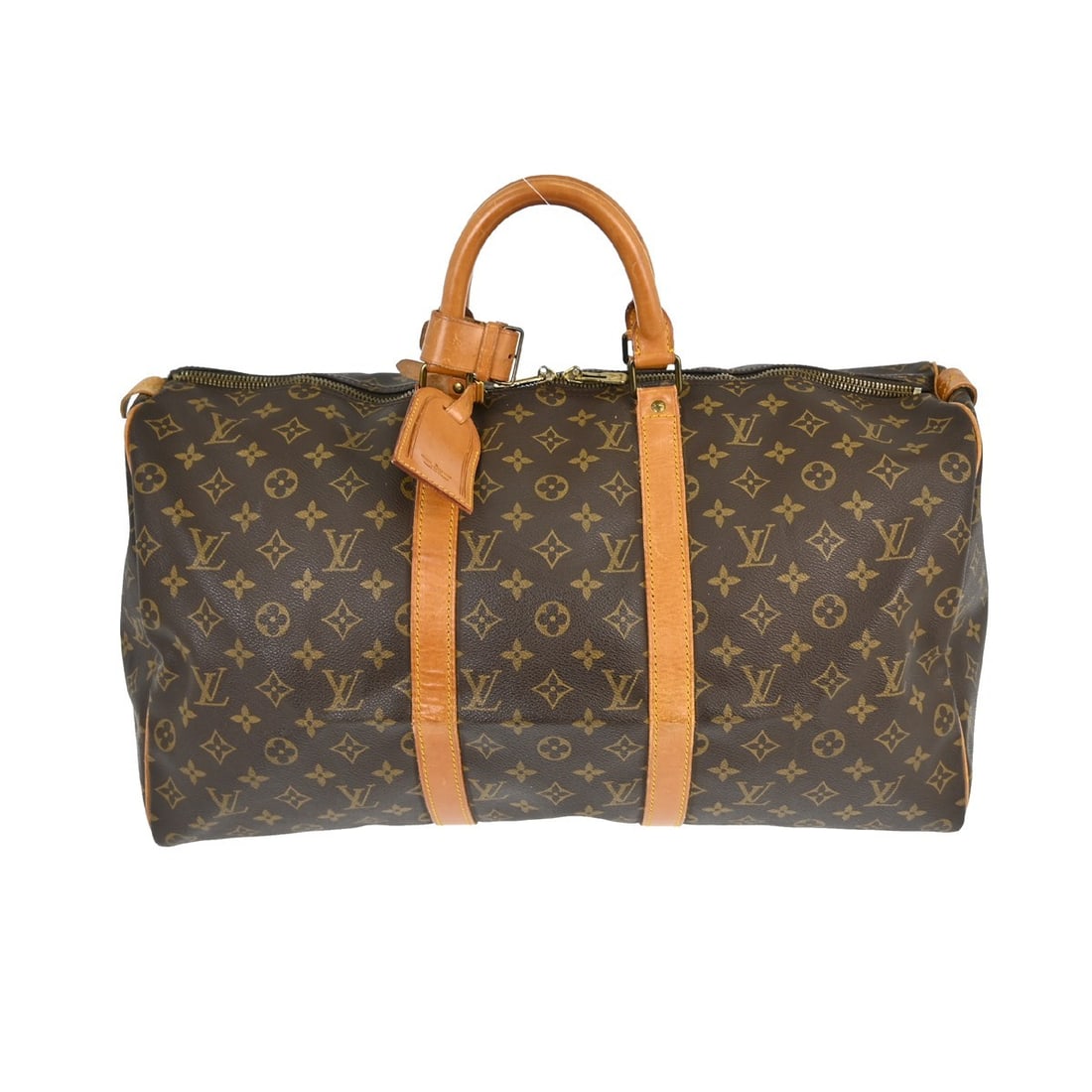 Keepall Monogram Canvas Travel Duffel by Louis Vuitton: Keepall Monogram Canvas Travel Duffel by Louis Vuitton This Louis Vuitton Keepall Bag features the iconic Monogram canvas in brown and is designed for unisex use. The vintage bag shows signs of use, i