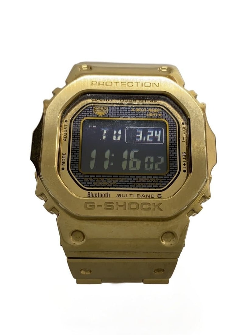 CASIO G-SHOCK Gold Stainless Steel Wristwatch GMW-B5000GD-9JF: CASIO G-SHOCK Gold Stainless Steel Wristwatch GMW-B5000GD-9JF This CASIO G-SHOCK GMW-B5000GD-9JF men's wristwatch features a durable stainless steel construction with a gold finish. Designed for relia