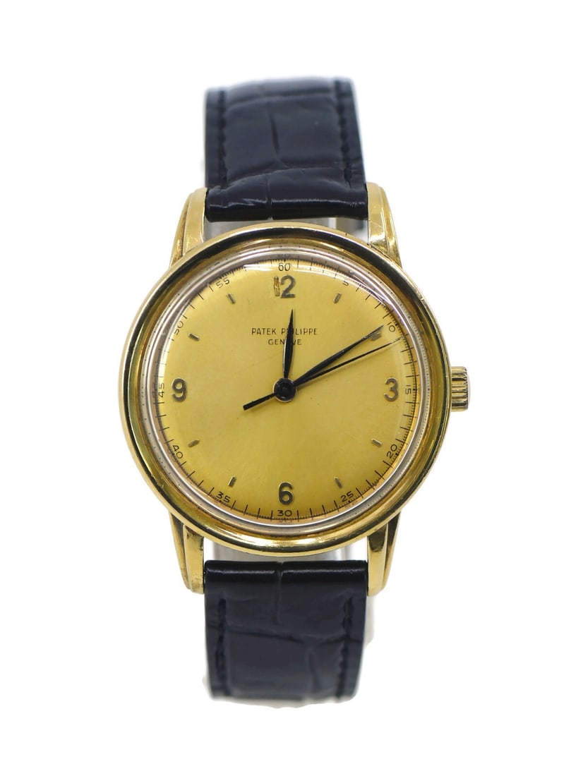 Patek Philippe Calatrava Jumbo 18K Yellow Gold Watch Ref 2481: Patek Philippe Calatrava Jumbo 18K Yellow Gold Watch Ref 2481 Experience the elegance of the Patek Philippe Calatrava Jumbo, a luxurious wristwatch crafted from 18K yellow gold. This stunning timepiec