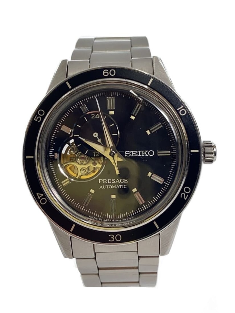Seiko Presage black stainless steel men's wristwatch: Seiko Presage black stainless steel men's wristwatch This SEIKO Presage 4R39-00Z0 men's wristwatch features a stainless steel case and band with a black dial. Made in Japan, it is designed for men and