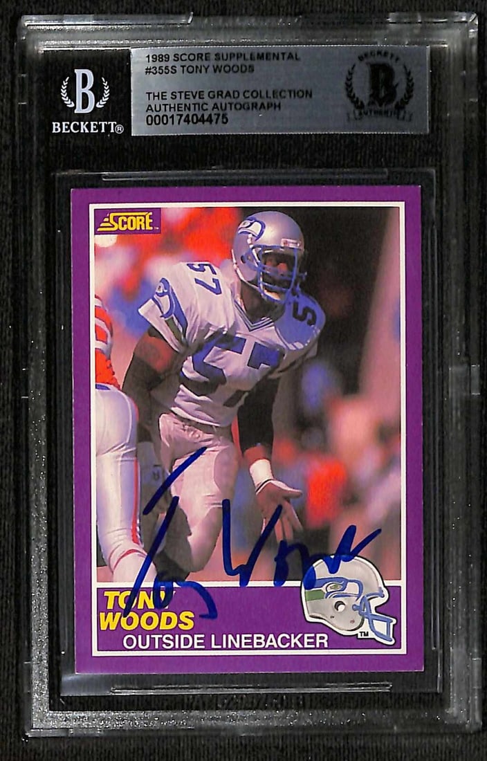 Tony Woods Signed 1989 Score Supplemental #355S Football Card Beckett Authenticated: Tony Woods Signed 1989 Score Supplemental #355S Football Card Beckett Authenticated This is an authentic signed trading card of Tony Woods, a linebacker for the Seattle Seahawks, from the 1989 Score S