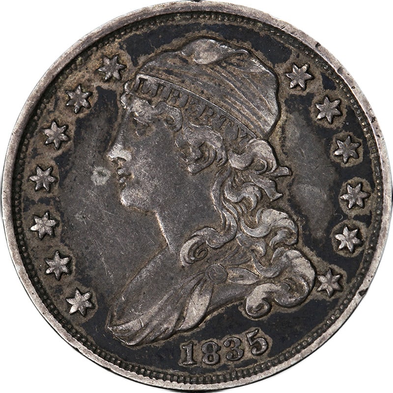 1835 Silver Bust Quarter Extra Fine Plus Strong Strike: 1835 Silver Bust Quarter Extra Fine Plus Strong Strike This original 1835 Bust Quarter features strong strike details and attractive eye appeal. The coin has a nice color and well-preserved surfaces. 