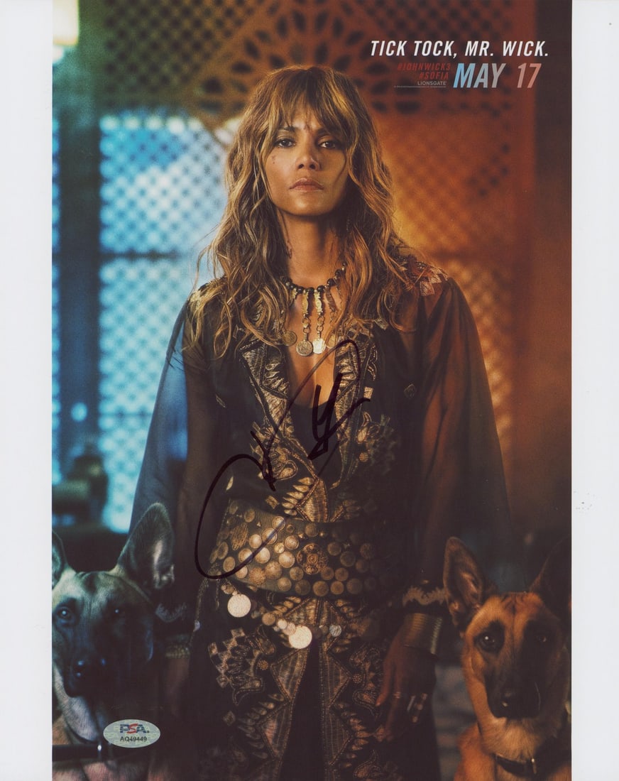 Halle Berry signed John Wick Chapter 3 11x14 PSA DNA photo: Halle Berry signed John Wick Chapter 3 11x14 PSA DNA photo This is an authentic 11x14 vertical photograph from John Wick Chapter 3, personally signed by Halle Berry. The autograph is verified by PSA/D