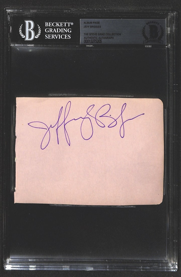 Jeff Bridges 1970s Signed Album Page Authenticated by Beckett: Jeff Bridges 1970s Signed Album Page Authenticated by Beckett This is an original autographed album page signed by actor Jeff Bridges in purple permanent marker. The signature is from the 1970s, provi