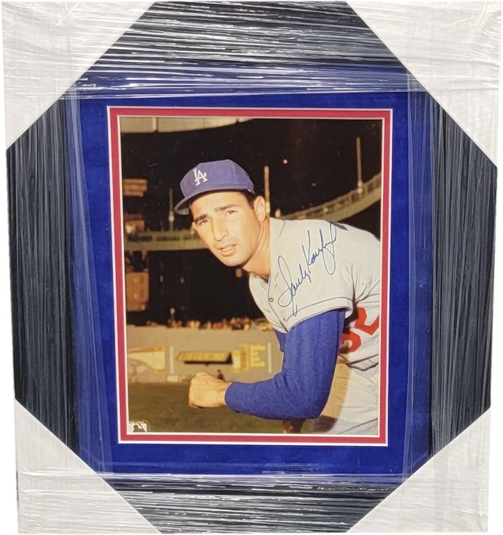 Sandy Koufax Signed 8x10 Dodgers Photo with Certificate of Authenticity: Sandy Koufax Signed 8x10 Dodgers Photo with Certificate of Authenticity This is an original 8x10 photo autographed by Sandy Koufax of the Los Angeles Dodgers. The photograph is hand signed and comes w