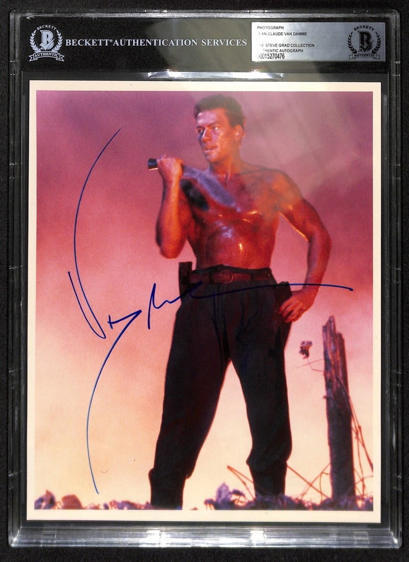 Beckett 10 Autographed 8x10 Photo by Jean-Claude Van Damme in Slab Case: Beckett 10 Autographed 8x10 Photo by Jean-Claude Van Damme in Slab Case This is an 8x10 color photograph signed by actor Jean-Claude Van Damme in blue permanent marker. The autograph was obtained in p