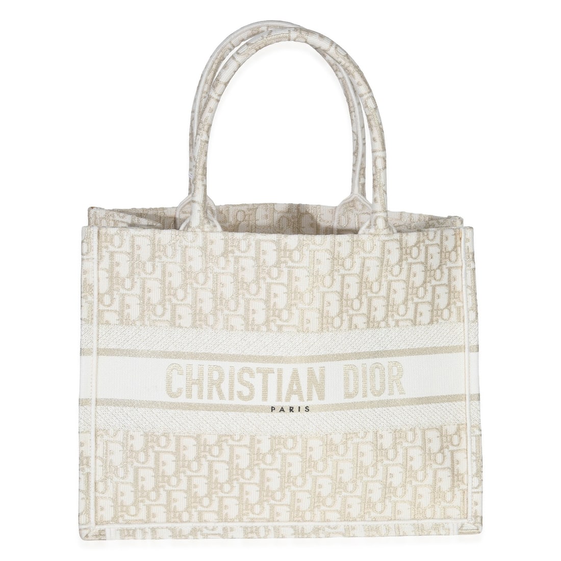 Book Tote Canvas Handbag with Oblique Embroidery in White Gold by Christian Dior: Book Tote Canvas Handbag with Oblique Embroidery in White Gold by Christian Dior This Christian Dior Book Tote features a white and gold tone Oblique embroidery on canvas, offering a stylish and versa