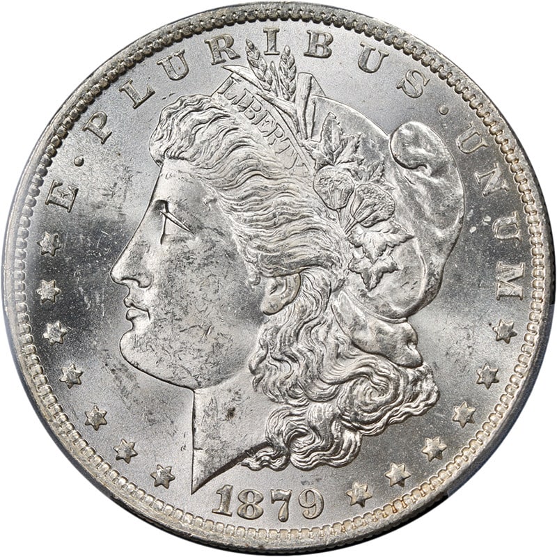 PCGS MS63 1879-O Morgan Silver Dollar Uncirculated Blast White: PCGS MS63 1879-O Morgan Silver Dollar Uncirculated Blast White This stunning 1879-O Morgan Silver Dollar is graded PCGS MS63, showcasing remarkable eye appeal with its brilliant, blast white finish. K