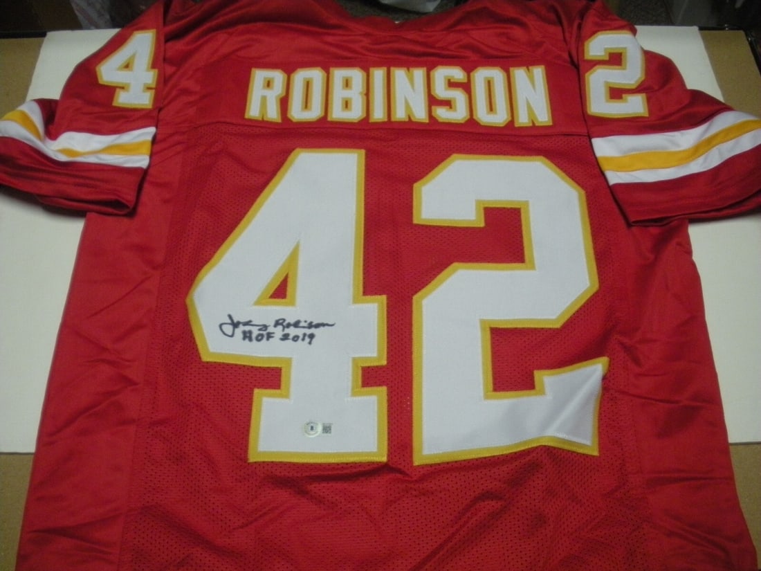 Johnny Robinson Signed Kansas City Chiefs Jersey HOF 19 COA: Johnny Robinson Signed Kansas City Chiefs Jersey HOF 19 COA This authentic Kansas City Chiefs jersey is signed by Hall of Fame player Johnny Robinson, a legendary figure in NFL history. Showcasing his