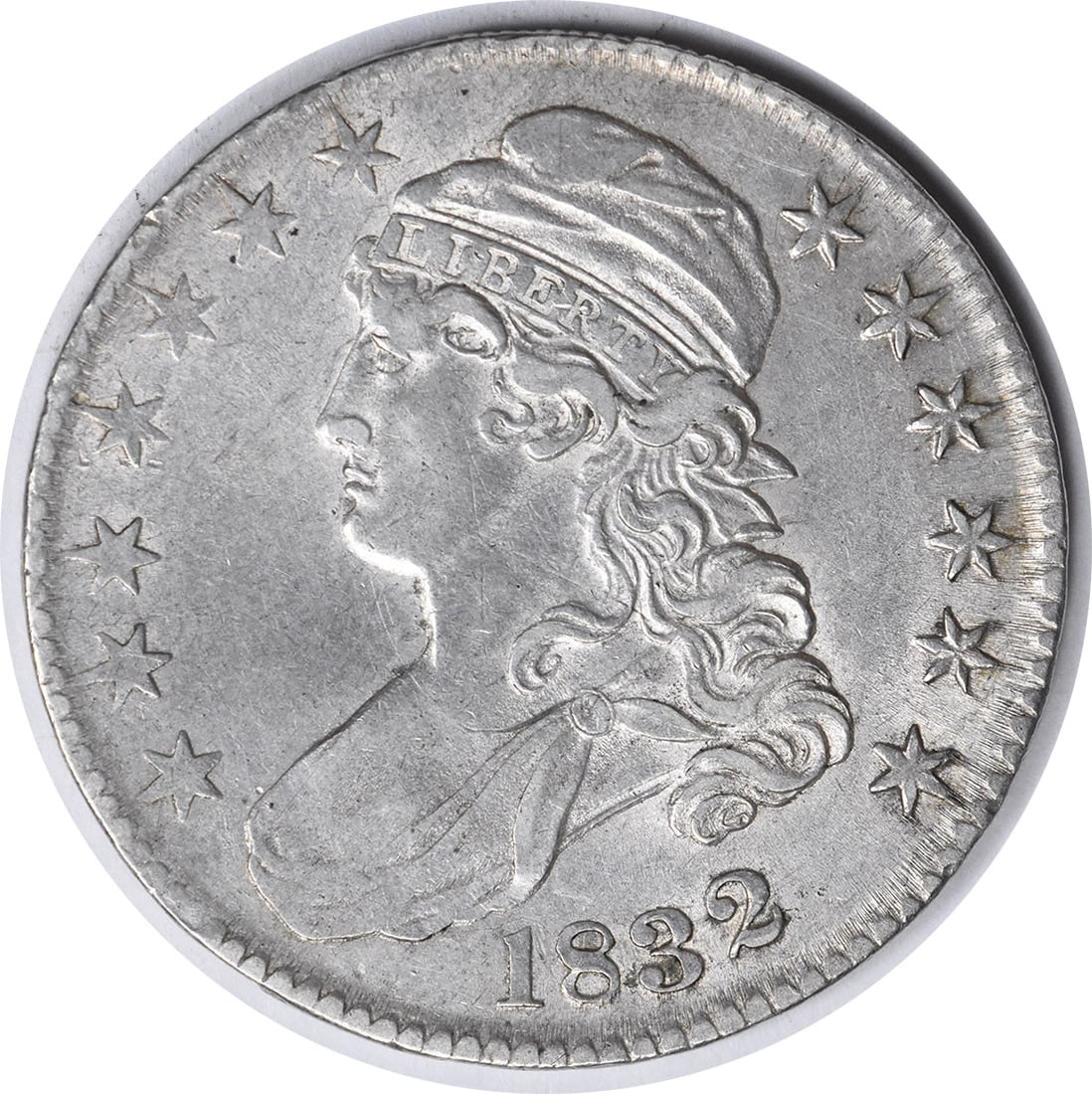 1832 Bust Half Dollar AU John Reich 50C Uncertified Coin: 1832 Bust Half Dollar AU John Reich 50C Uncertified Coin This 1832 Bust Half Dollar features small letters and is classified as AU (About Uncirculated). Minted in Philadelphia, it showcases the artist