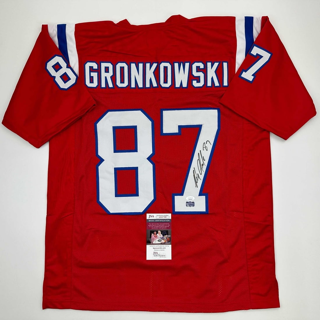 Rob Gronkowski Autographed New England Patriots Jersey JSA COA: Rob Gronkowski Autographed New England Patriots Jersey JSA COA Celebrate your love for football with this authentic autographed red jersey of Rob Gronkowski, the star tight end of the New England Patr