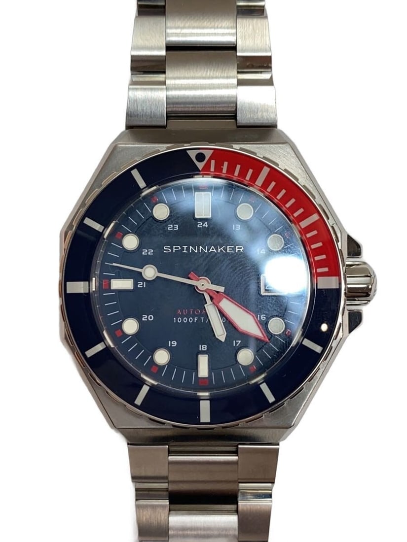 Spinnaker Dumas SP-5081 Navy Dial Automatic Men's Wristwatch: Spinnaker Dumas SP-5081 Navy Dial Automatic Men's Wristwatch This SPINNAKER Dumas SP-5081 is an automatic wristwatch designed for men, featuring a navy dial and a stainless steel case and band. Made i