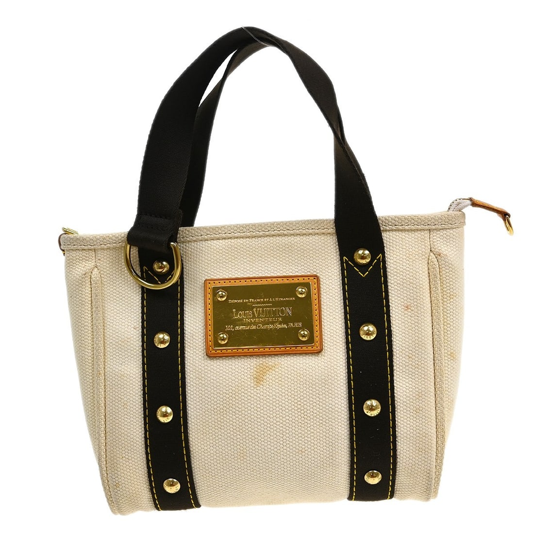 Louis Vuitton Antigua Cabas PM White Canvas Tote Bag M40039: Louis Vuitton Antigua Cabas PM White Canvas Tote Bag M40039 This Louis Vuitton Antigua Cabas PM tote bag features a white canvas exterior with brown double handles and a zip closure. It is a vintage m