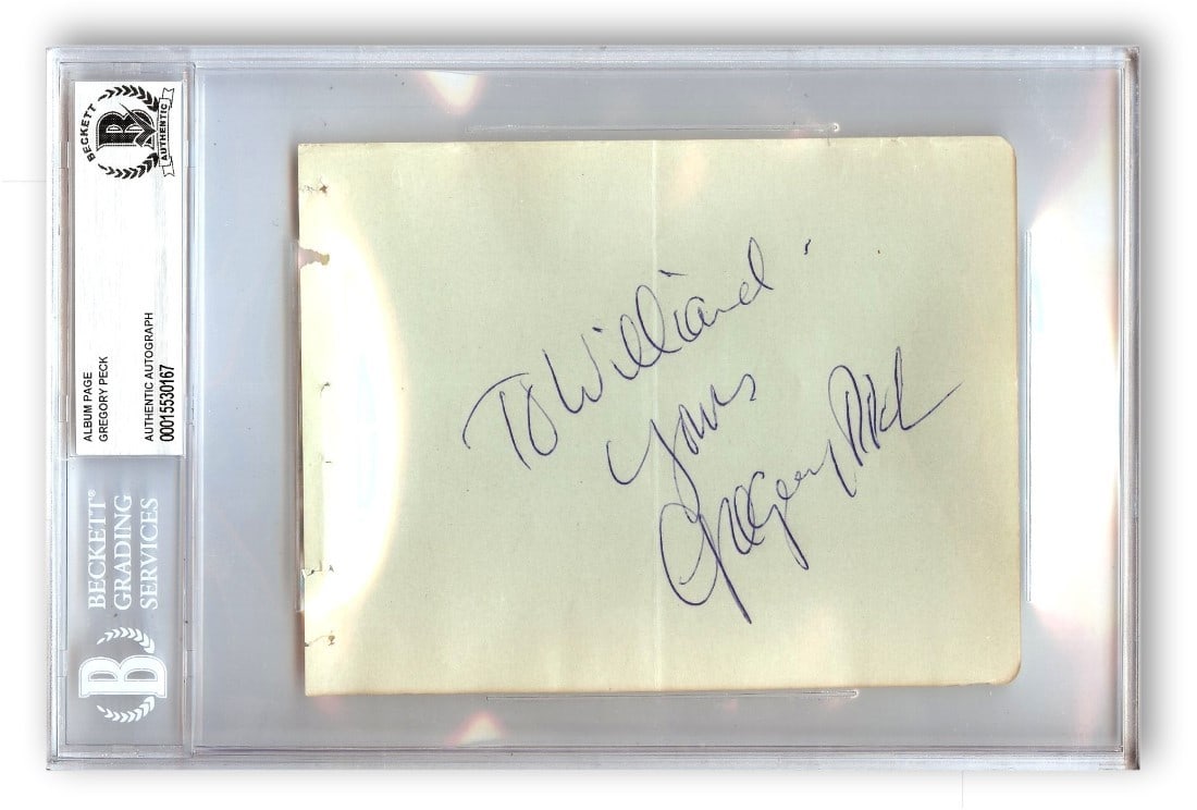 Gregory Peck Authentic Signature Album Page with Beckett Authentication: Gregory Peck Authentic Signature Album Page with Beckett Authentication This autographed album page features the signature of Hollywood legend Gregory Peck. The album page is authenticated by Beckett 