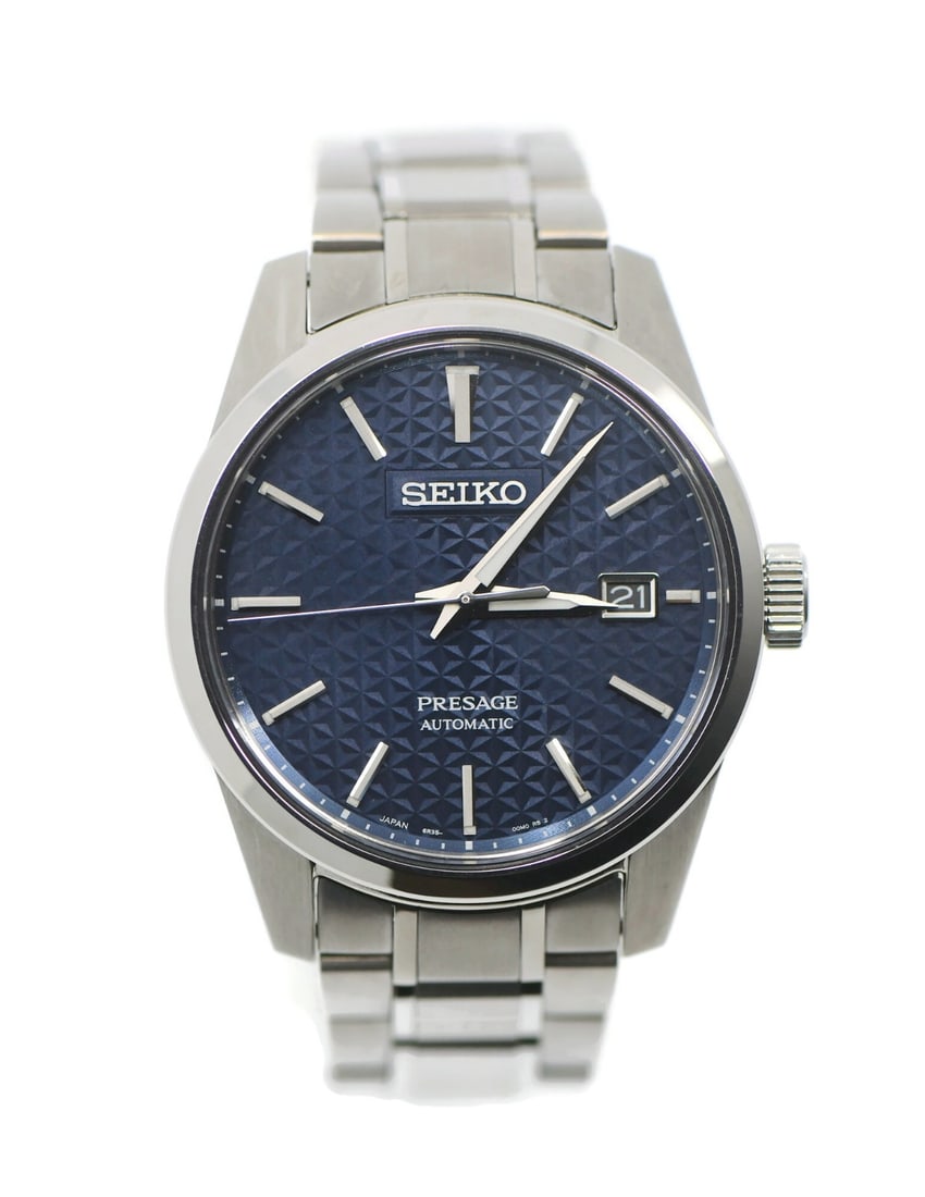 Seiko Pressage Blue Dial Automatic Stainless Steel Wristwatch SPB167: Seiko Pressage Blue Dial Automatic Stainless Steel Wristwatch SPB167 This Seiko Presage SPB167 is a men's automatic wristwatch featuring a blue dial and stainless steel case and band. It offers an ana